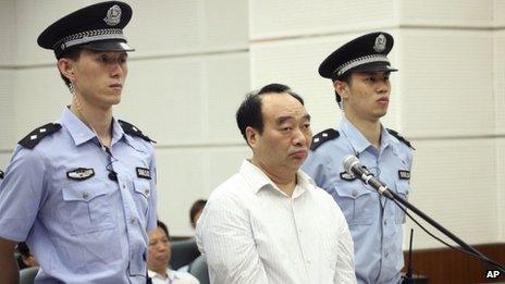 File photo: Lei Zhengfu, centre, former Communist Party chief of Chongqing city's Beibei district, who was involved in a sex tape scandal