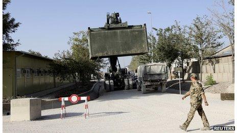 A truck transports a military container in the German army camp in Kunduz (2 Sept 2013)