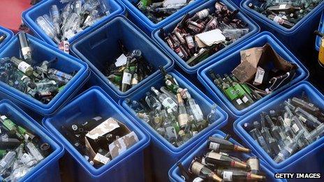 Bottles in recycling bins