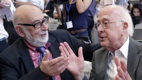 British physicist Peter Higgs (right) talking with Belgium physicist Francois Englert in July 2012