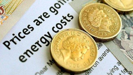 Coins and an energy bill