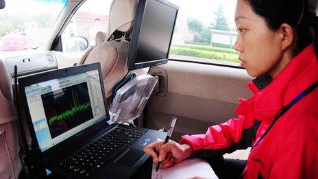 Monitoring radio signals to catch exam cheats
