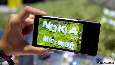 The words "Nokia" and "Microsoft" on the Lumia 1020 Windows smart phone