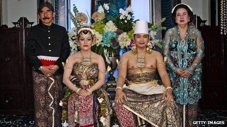 KPH Notonegoro and Gusti Kanjeng Ratu Hayu with family pose for a photograph during their wedding ceremony