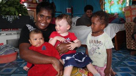 Lemba, who Madeleine interviewed, with Scarlett and her own children
