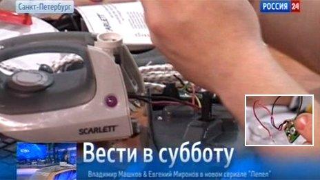 Screengrab from Rossiya 24, with inset of the "hidden chip"