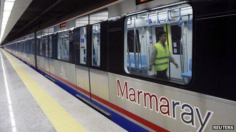 An engineer performs last-minute checks on a Marmaray train. Photo: 29 October 2013