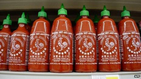 Bottles of Huy Fong brand Sriracha chili sauce are seen for sale at a grocery store in Los Angeles, California 30 October 2013
