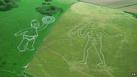 Giant Homer Simpson appears at Cerne Abbas