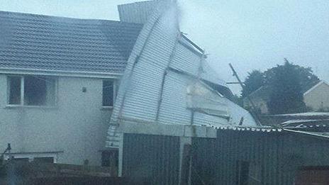 A garage blew onto a house in Beddau near Pontypridd