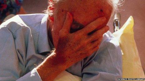Dementia sufferer covering his face