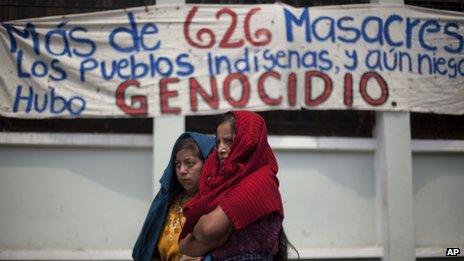 Ixil women gather protest in front of the constitutional court against the decision to annul the genocide conviction of Efrain Rios Montt on 24 May , 2013.