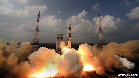 Rocket carrying the Mars Orbiter Spacecraft blasting off from the launch pad at Sriharikota