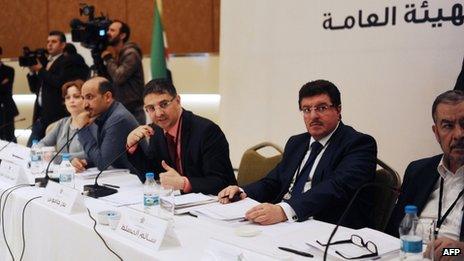 Members of the Syrian National coalition (SNC) attend a meeting of the National Coalition on November 9, 2013, in Istanbul