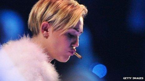 Miley Cyrus smoking at the MTV EMAs