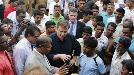 David Cameron meets displaced Tamils living in a refugee camp