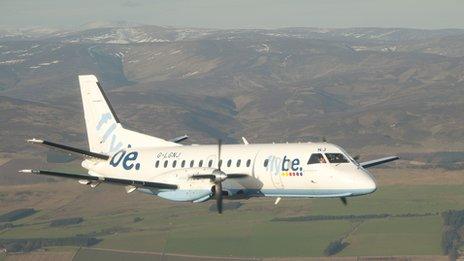 Loganair aircraft flying under Flybe livery