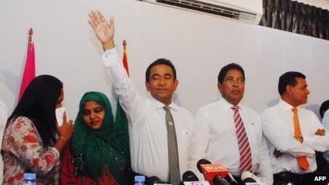 Abdulla Yameen (centre) waves to his supporters in Male. Photo: 17 November 2013