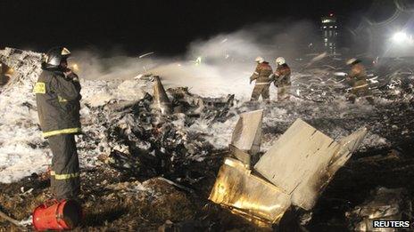 Rescue workers working at the crash site