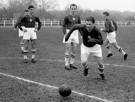 Ferenc Puskas (C) training with Renault workers on 21 November 1953