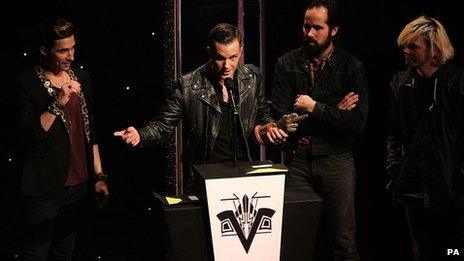The Killers receiving an award