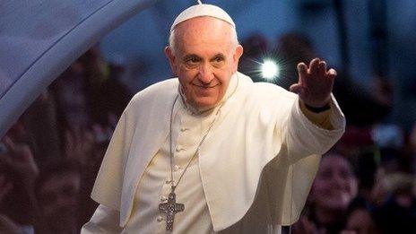 Pope Francis waves while in Rio de Janeiro on July 26, 2013.