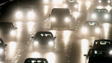Cars on a motorway during the evening