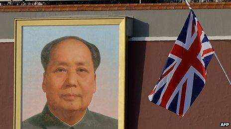 A union flag is displayed near a portrait of late Chinese leader Mao Zedong