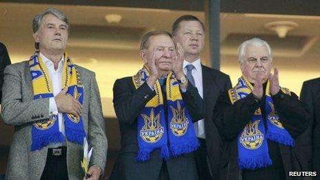 Ukraine's former Presidents Viktor Yushchenko (L), Leonid Kravchuk (R) and Leonid Kuchma (centre) stand before the 2014 World Cup qualifying soccer match between Ukraine and England at the Olympic stadium in Kiev September 10, 2013