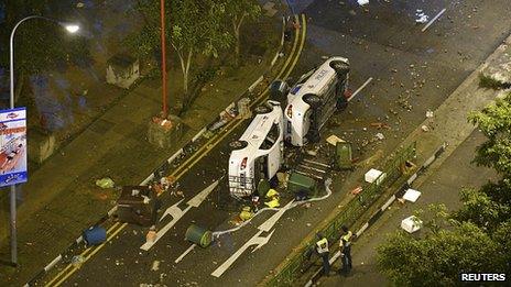 Police cars overturned in Singapore. 8 Dec 2013