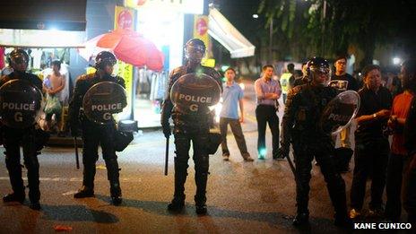 Police in riot gear in Little India, Singapore, 8 December 2013