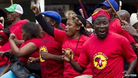 Members of the National Union of Metalworkers of South Africa (NUMSA) march through the Durban central business district, September 12, 2013.