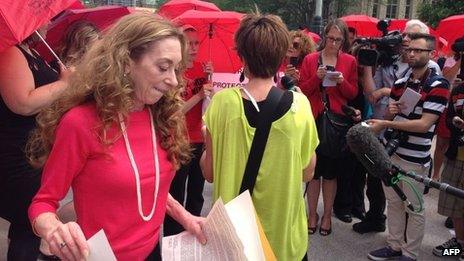 Valerie Scott (left) leaves the Canadian Supreme Court in Ottawa on 13 June 2013
