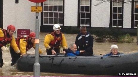 people rescued in a boat