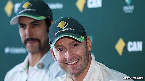 Michael Clarke with Mitchell Johnson in the background