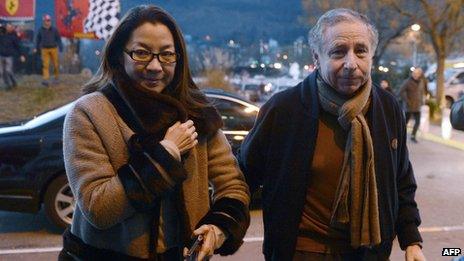 International Automobile Federation (FIA) President Jean Todt and his wife Michelle Yeoh arrive to visit Michael Schumacher on December 31, 2013