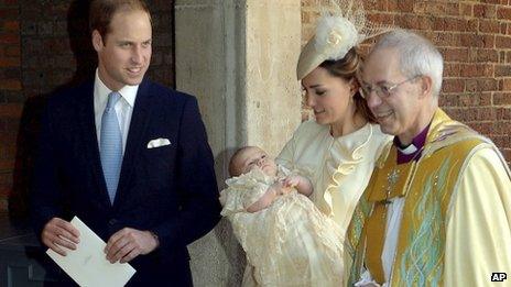 Britain's Prince William, right, Kate Duchess of Cambridge with their son Prince George leave the Chapel Royal in St James's Palace in London, with the Archbishop of Canterbury Justin Welby