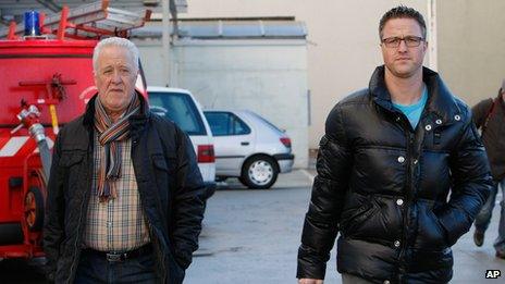 Michael Schumacher's father Rolf, left, and brother Ralf arrive at Grenoble Hospital, French Alps, (Jan. 5, 2014)