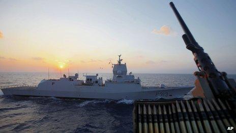 The Norwegian warship Helge Ingstad passes by the Danish warship Esbern Snare at sea between Cyprus and Syria (5 January 2014)