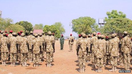 South Sudanese soldiers gather for a briefing at the army general headquarters in Juba on 8 January 2014