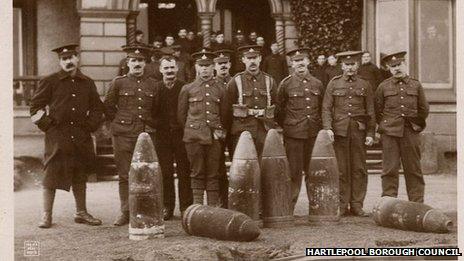 soldiers posing with defused shells outside of a hotel in Seaton Carew