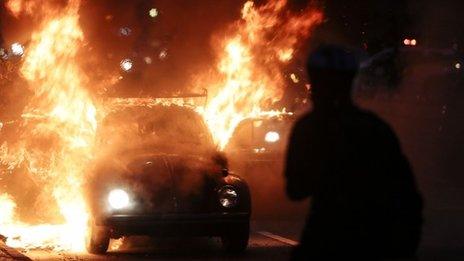 A car burns in flames during in Sao Paulo, Brazil, on January 25, 2014.