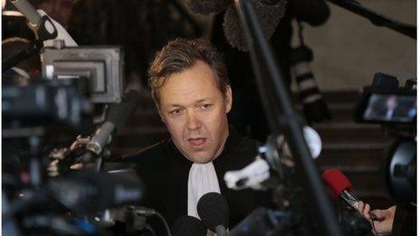 Lawyer Sylvain Cormier addresses journalists before the opening of the trial of his client Karim Benzema on 20 January 2014