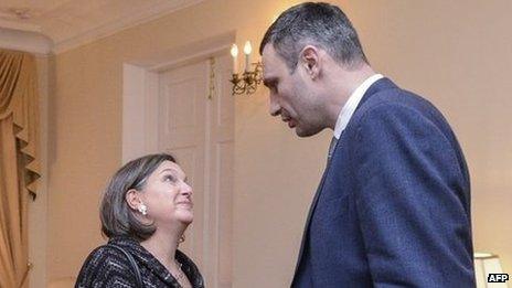 Head of UDAR (Punch) party Vitaly Klitschko (right) welcomes US State Department Assistant Secretary of State for European and Eurasian Affairs Victoria Nuland prior talks with the Ukrainian opposition in Kiev late 6 February 2014