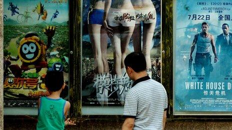 Looking at film posters in Beijing