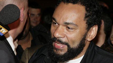 Controversial humorist Dieudonne M'Bala arrives to support the Front National's (FN) presidential candidate Jean-Marie Le Pen at the party election site following the first round of the French Presidential election on on 22 April 2007 in Paris, France.