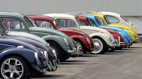 Line of VW beetles