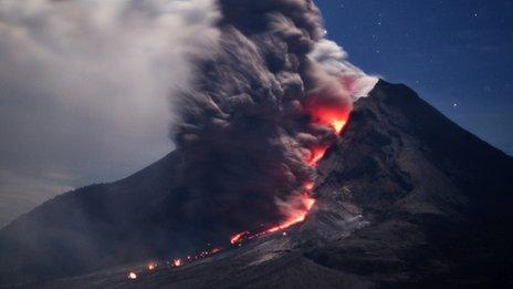 Sinabung volcano spews hot ash and lava in Karo, Indonesia on 14 January 2014