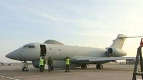 The Sentinel sits on the runway prior to taking off for the mission