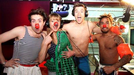 Sara with Nick Grimshaw (l), Greg James and Dev (r) during 2013 Red Nose Day